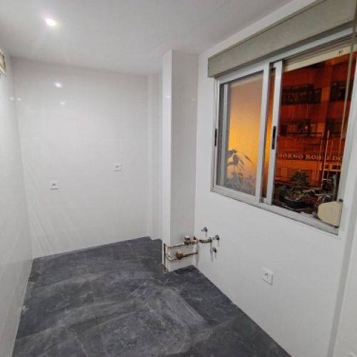 Cocina reformada dentro de proyecto de vivienda en Oviedo